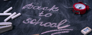 Back to school words written on chalk board